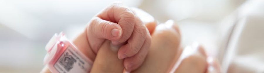 baby and mother hands