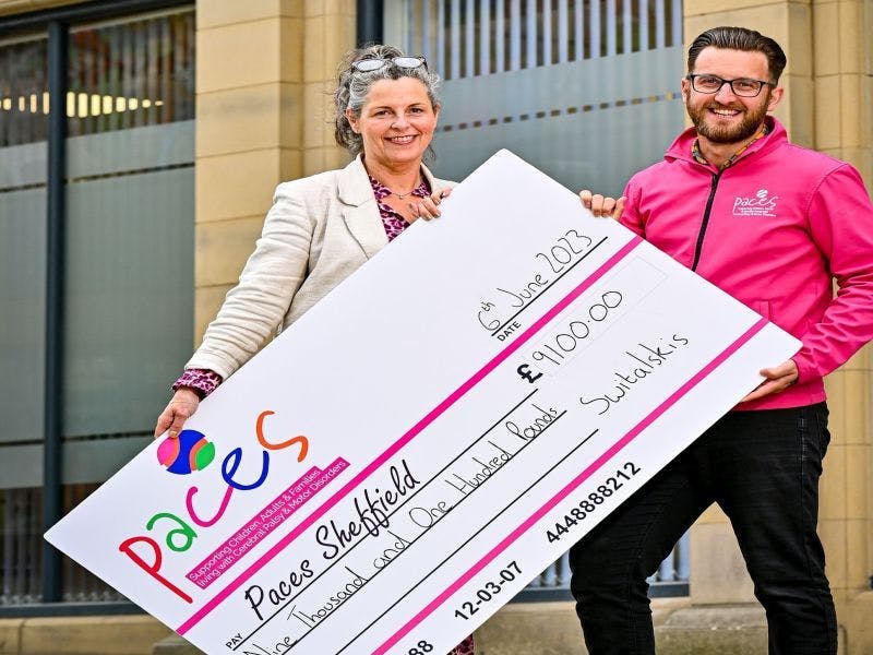 Suzanne presenting cheque to paces