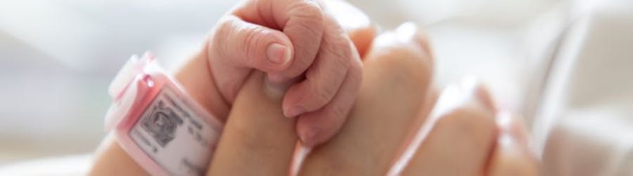 mother and baby hands