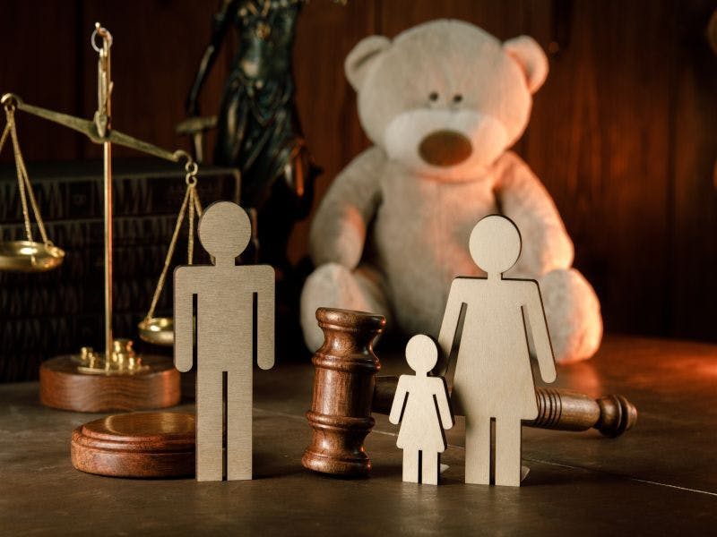 teddy and wooden family figures