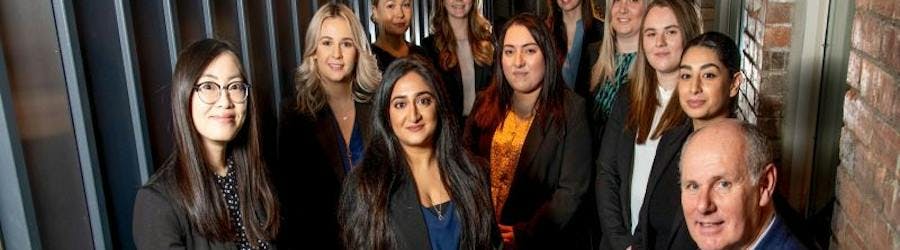 nine new trainee solicitors